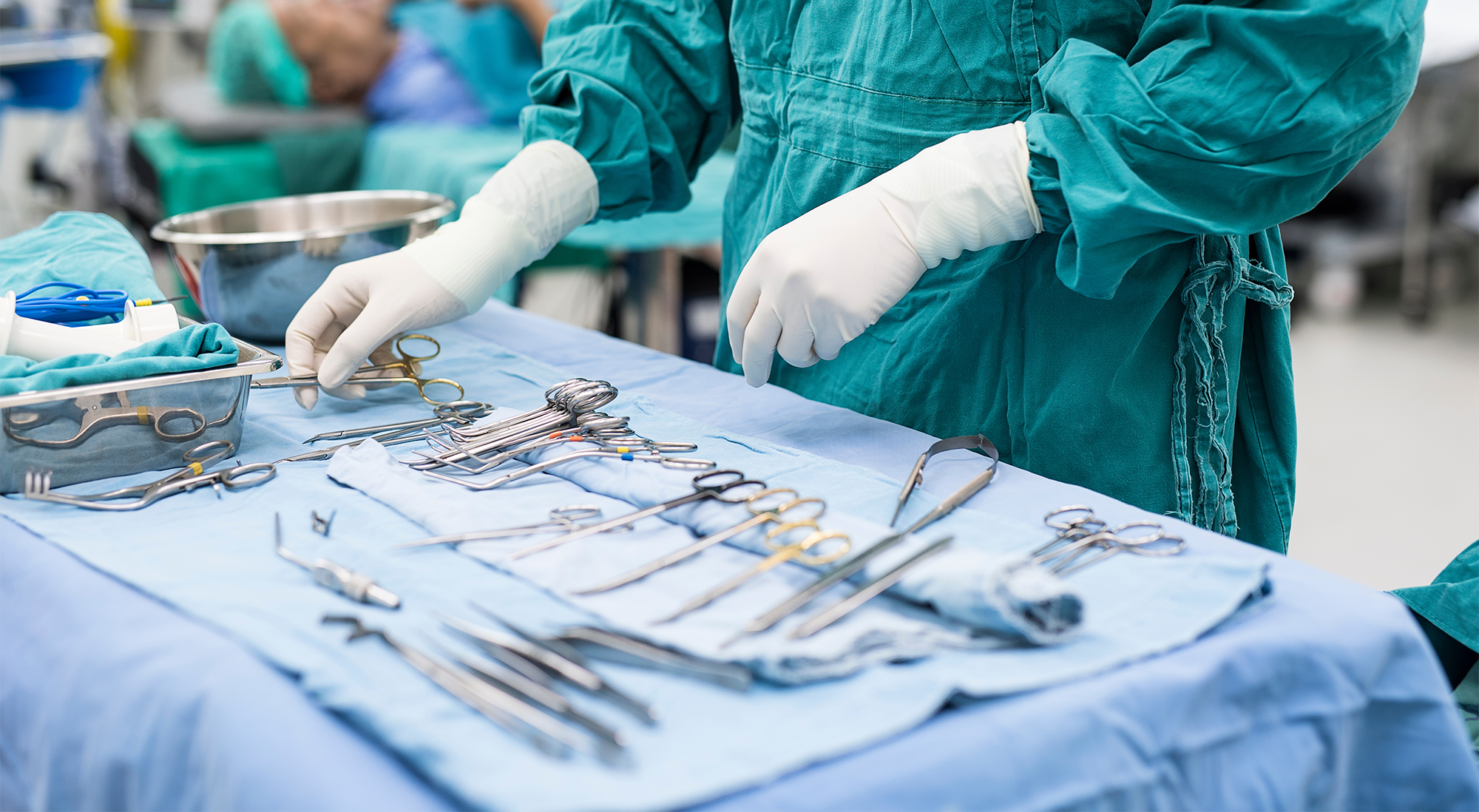 A medical professional with surgery tools