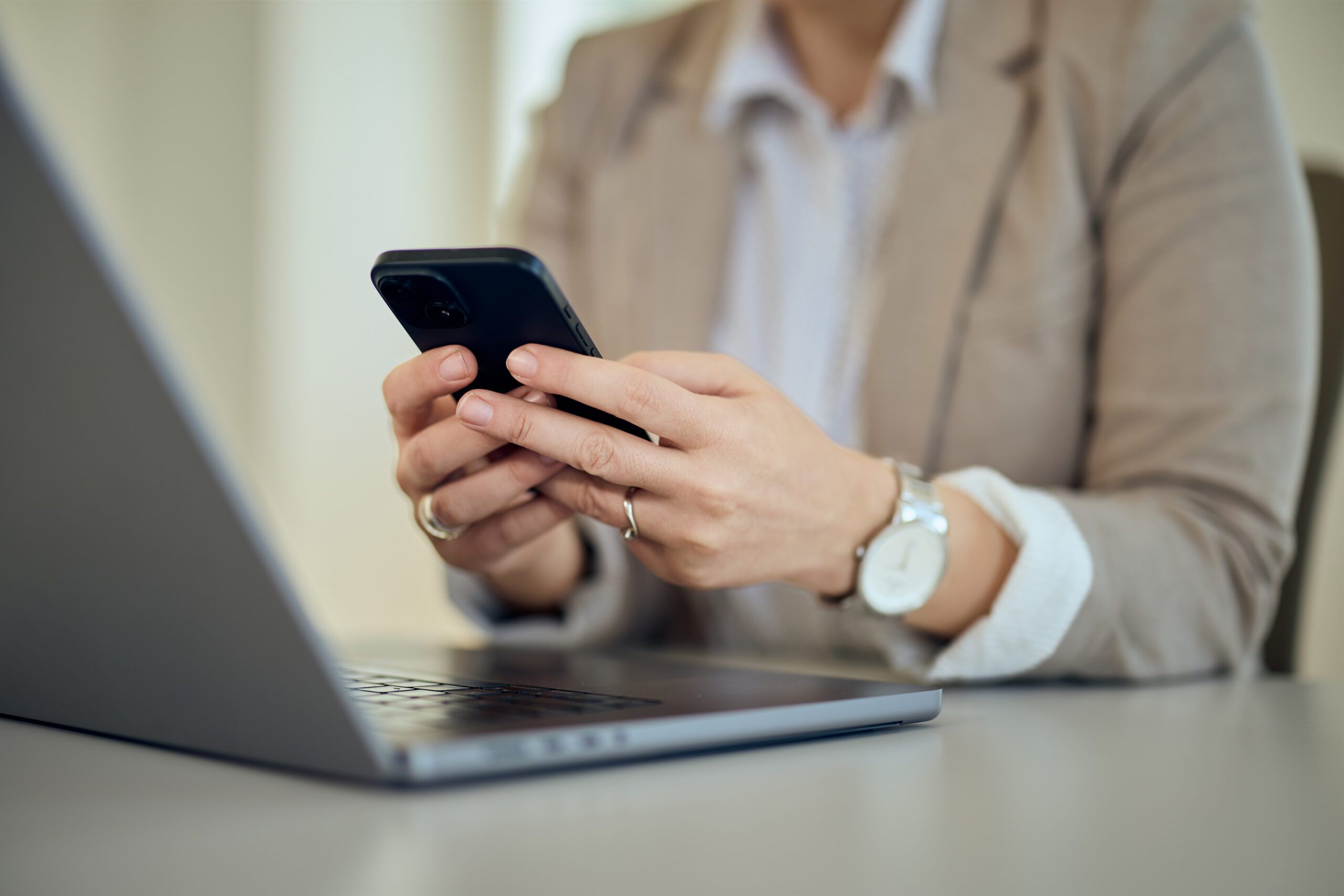 Person looking at phone alerts